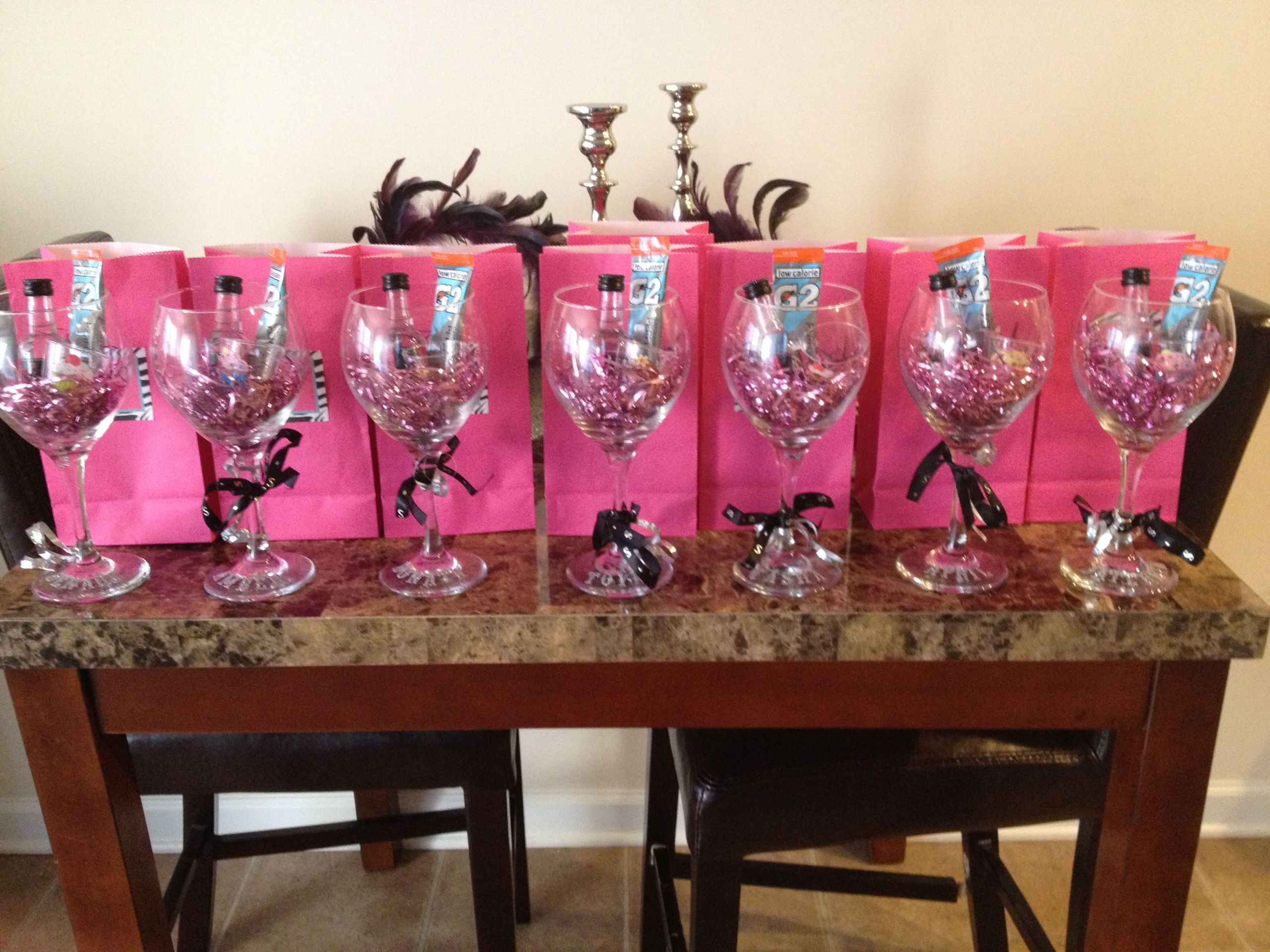 Gift Ideas For Girls Weekend
 Girls Trip Gifts A wine glass with shot bottles and a