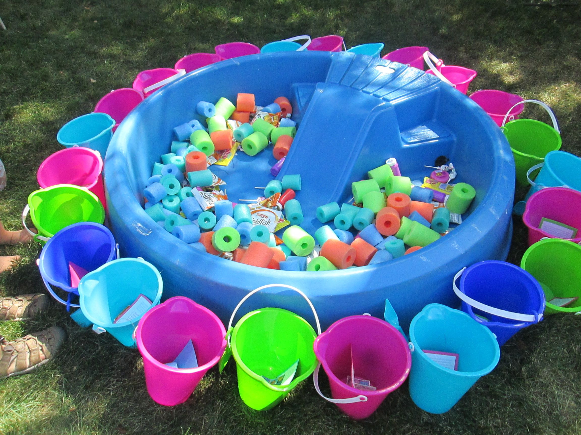 Baby Pool Party
 Fill a baby pool with cut up pool noodles and goody bag