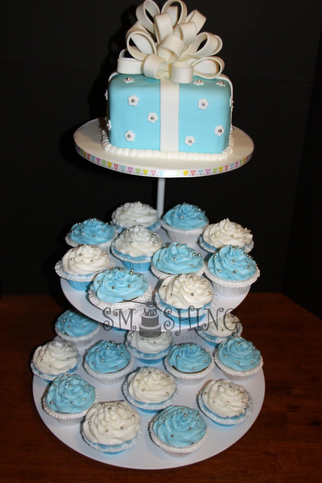 Baby Shower Cakes And Cupcakes
 Smashing Cake Designs Blue and white baby shower cupcake