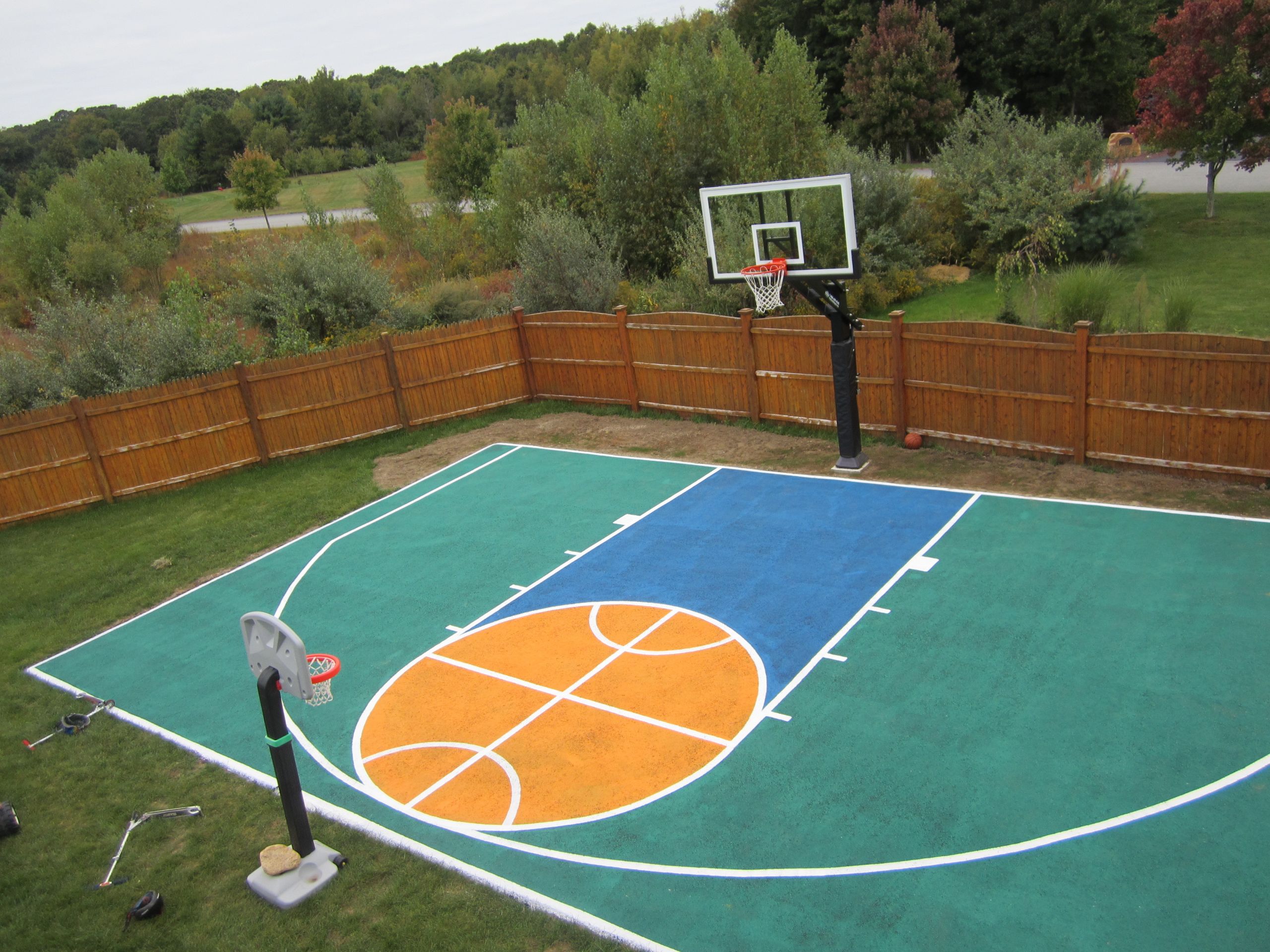 Backyard Half Court Basketball
 There s aerial view of the half court and Pro Dunk