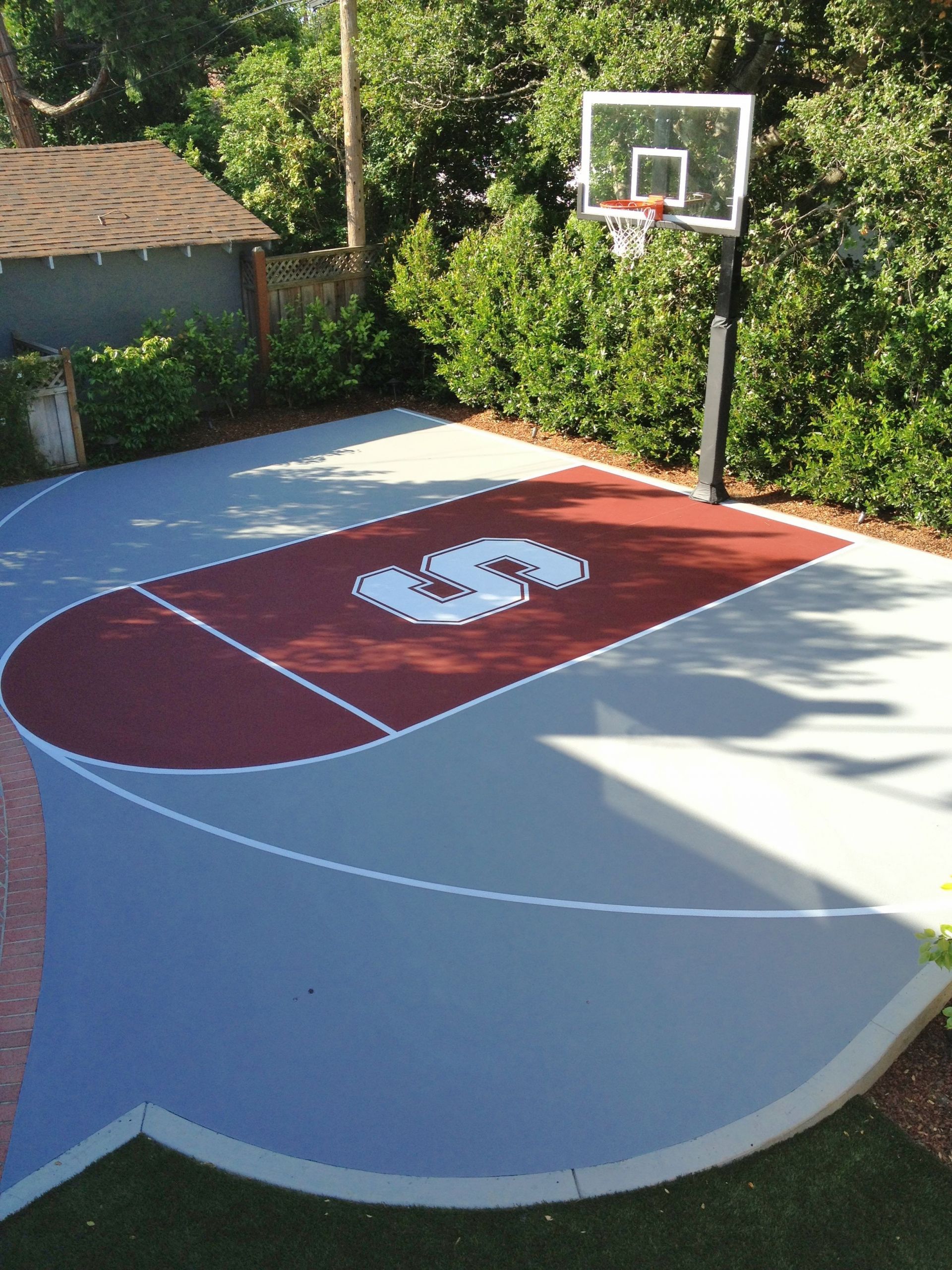 Backyard Half Court Basketball
 Mark has created a great Stanford half court in his