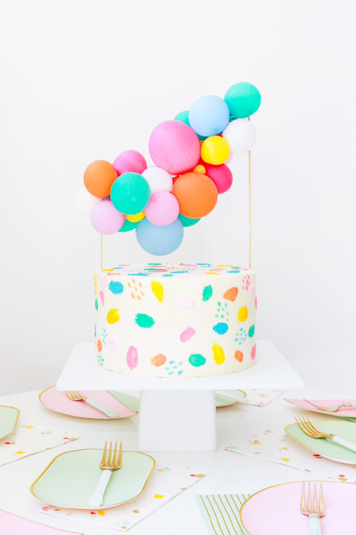 Balloon Birthday Cake
 DIY Balloon Garland Cake Topper and Tips for Painting Frosting
