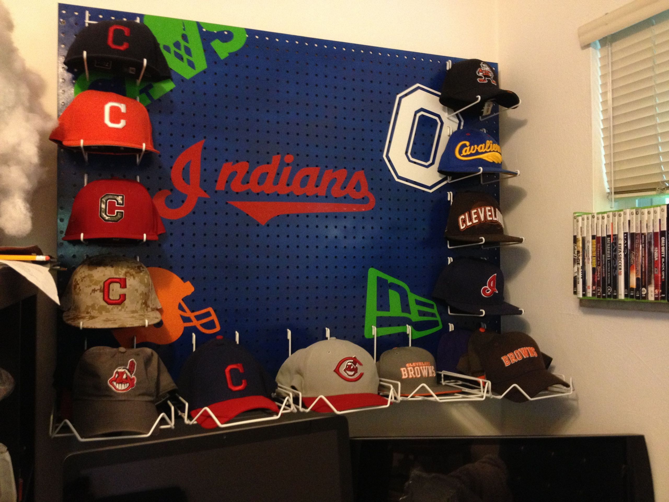 Baseball Cap Rack DIY
 Pegboard baseball cap hat rack Ohio sports theme for my
