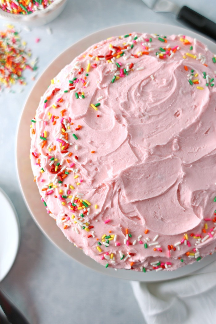 Birthday Cake Frosting
 Yellow Birthday Cake with Fluffy Pink Frosting Seasonly