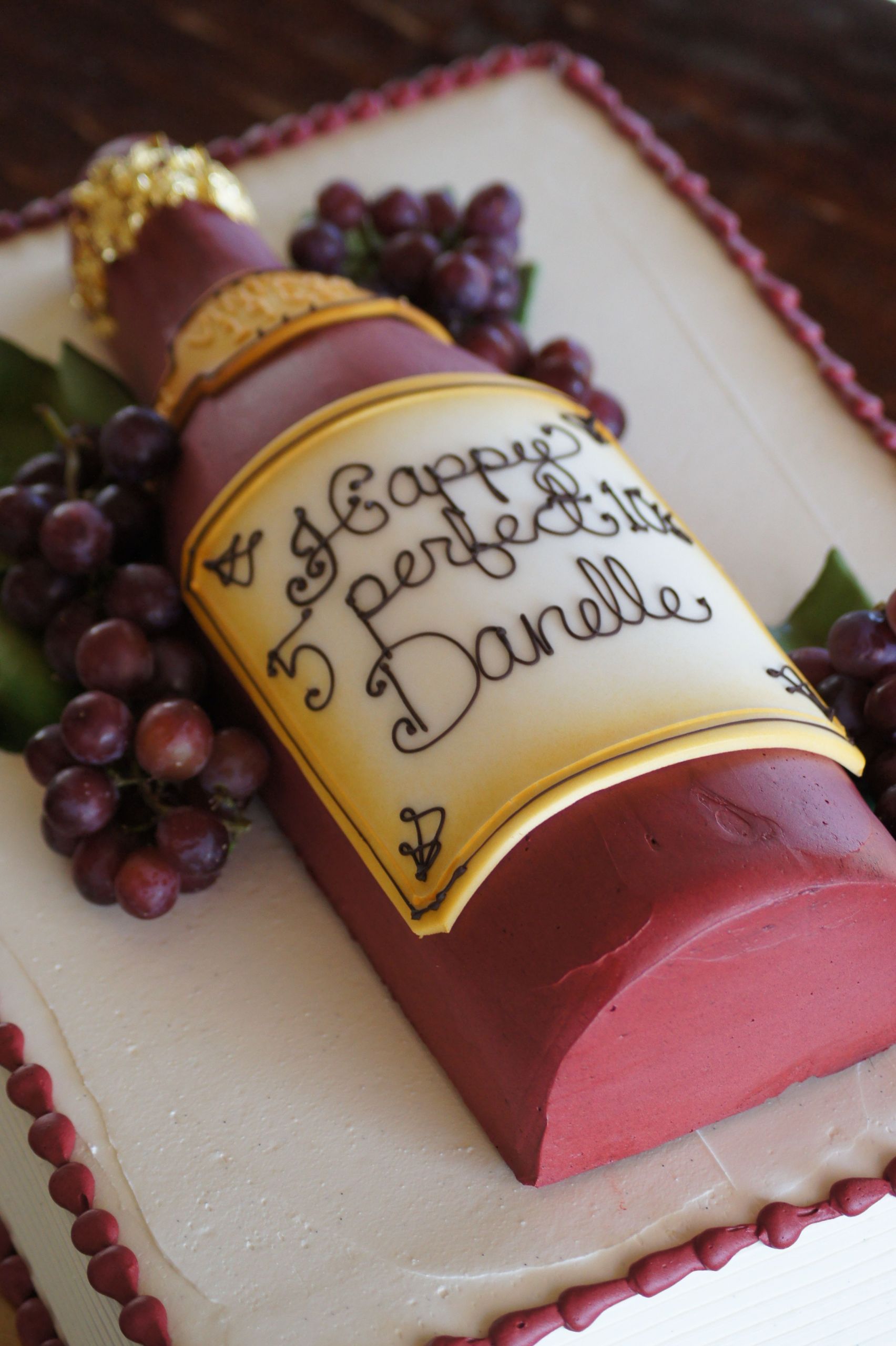Birthday Cake Vineyards
 Red wine bottle shaped birthday cake with grapes