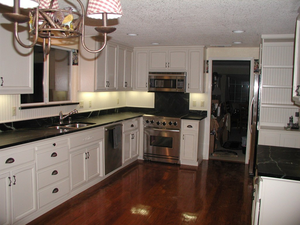 Black Kitchen Countertops
 Friday Afternoon White Cabinets