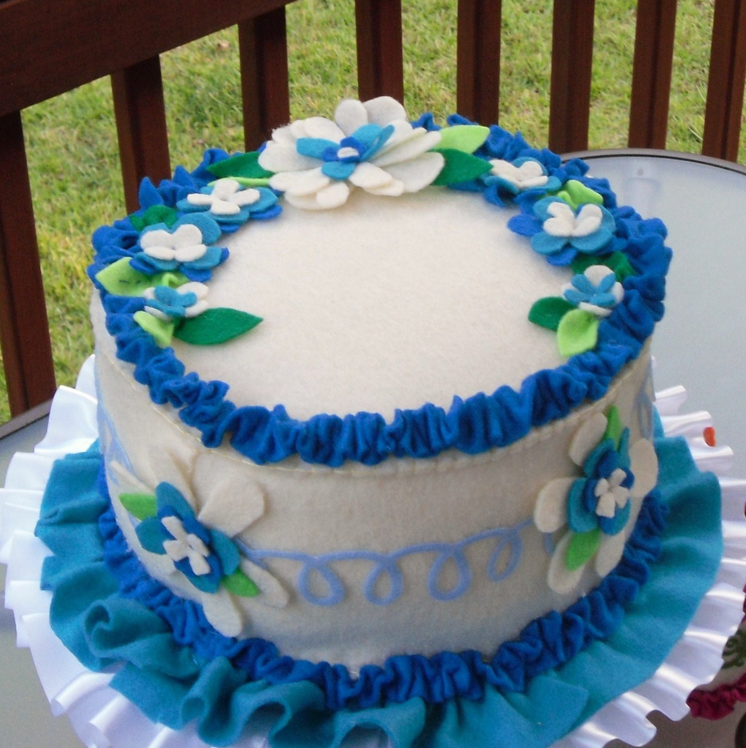 Blue Birthday Cakes
 felt birthday cake with multi layer flowers in cobalt and