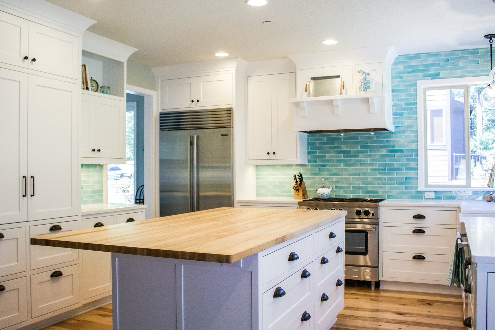 Blue Kitchen Tile Backsplash
 Custom designed kitchen with white cabinets and bold blue