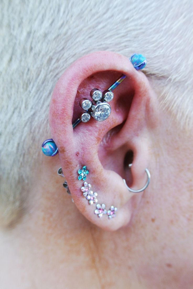 Body Jewelry Ears
 Custom industrial barbell with fancy cluster from