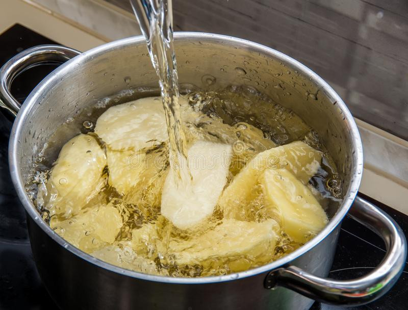 Boiling Potatoes For Mashed Potatoes
 Cooking Boiled Potatoes In The Mashed Potatoes In A Metal