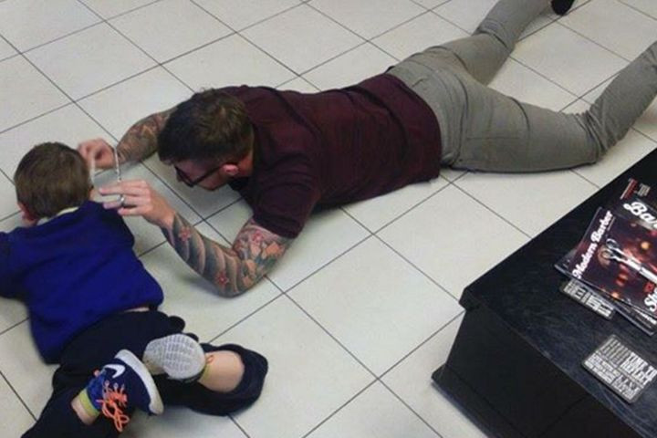 Boy'S Haircuts
 Barber Sits on the Floor in Order to Successfully Cut an