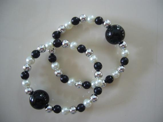 Bracelet For Motion Sickness
 Queasy Beads™ Motion Sickness Bracelets in Black & White