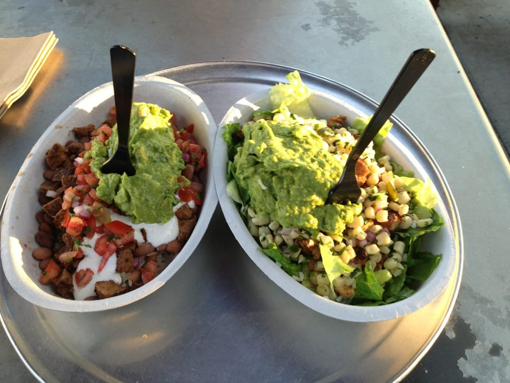 Chipotle Mexican Grill Guacamole
 Steak Bowl left and Salad right both served with