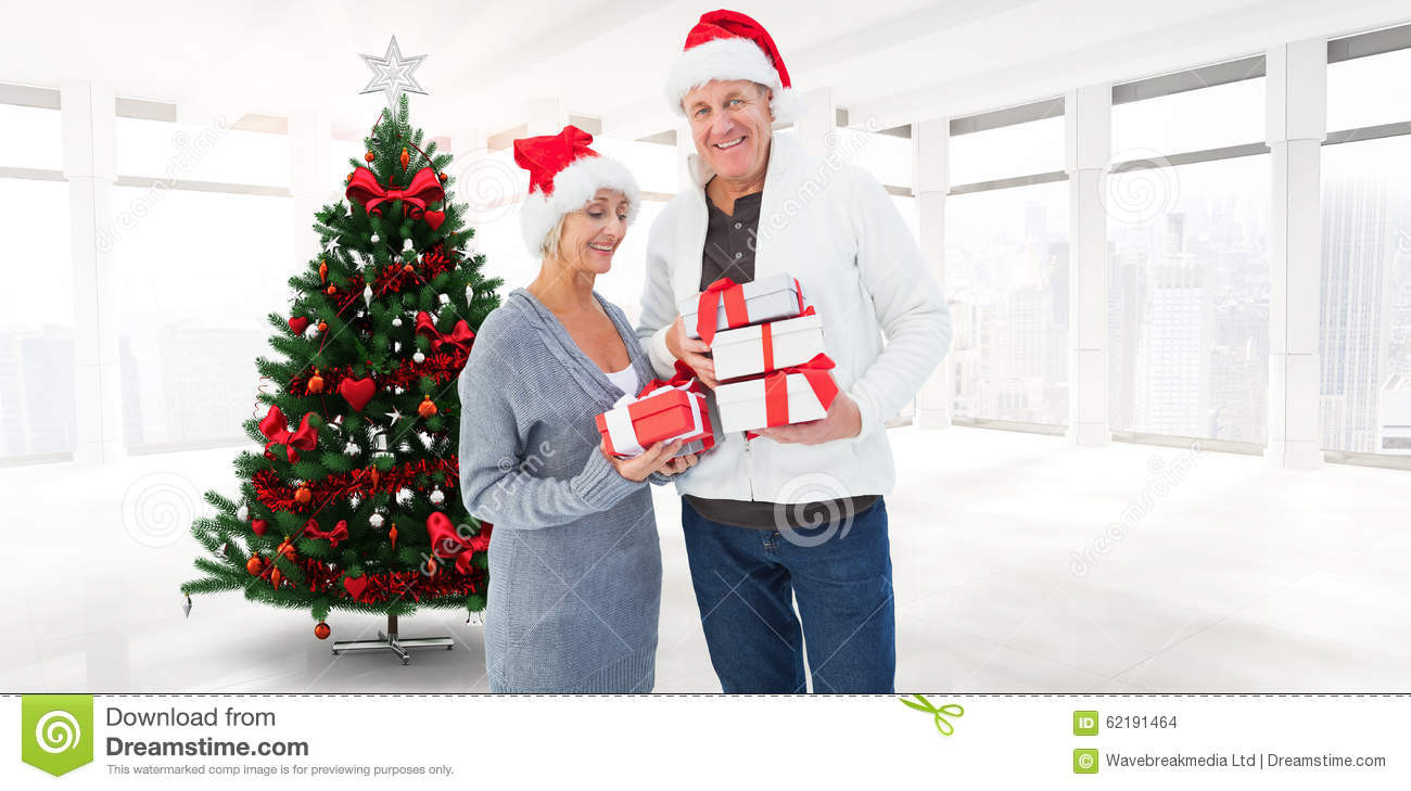 Christmas Gift Ideas For Older Couple
 posite Image Festive Mature Couple Holding Christmas