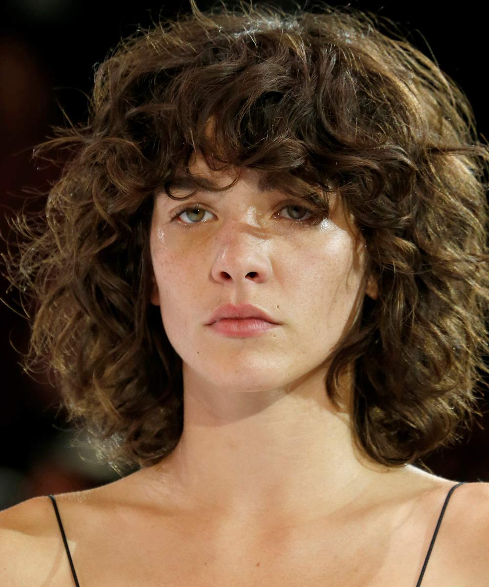 Curly Hairstyles With Bangs
 These Cool Girls Make Curly Bangs Look Effortlessly Wearable