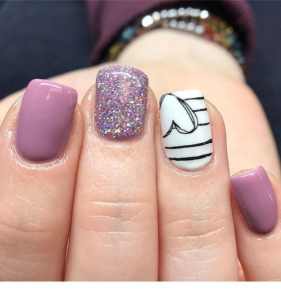 Cute Purple Nail Designs
 Cute light purple nails design with heart