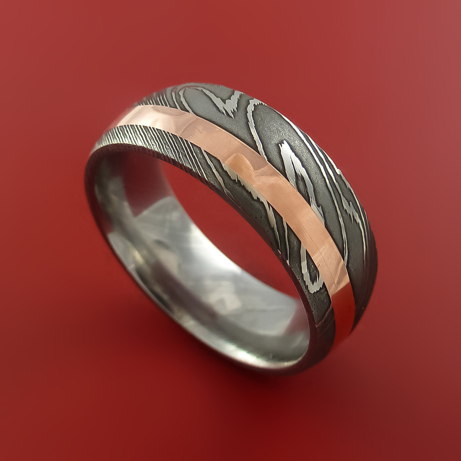 Damascus Steel Wedding Band
 Damascus Steel and Copper Ring Wedding Band Custom Made to