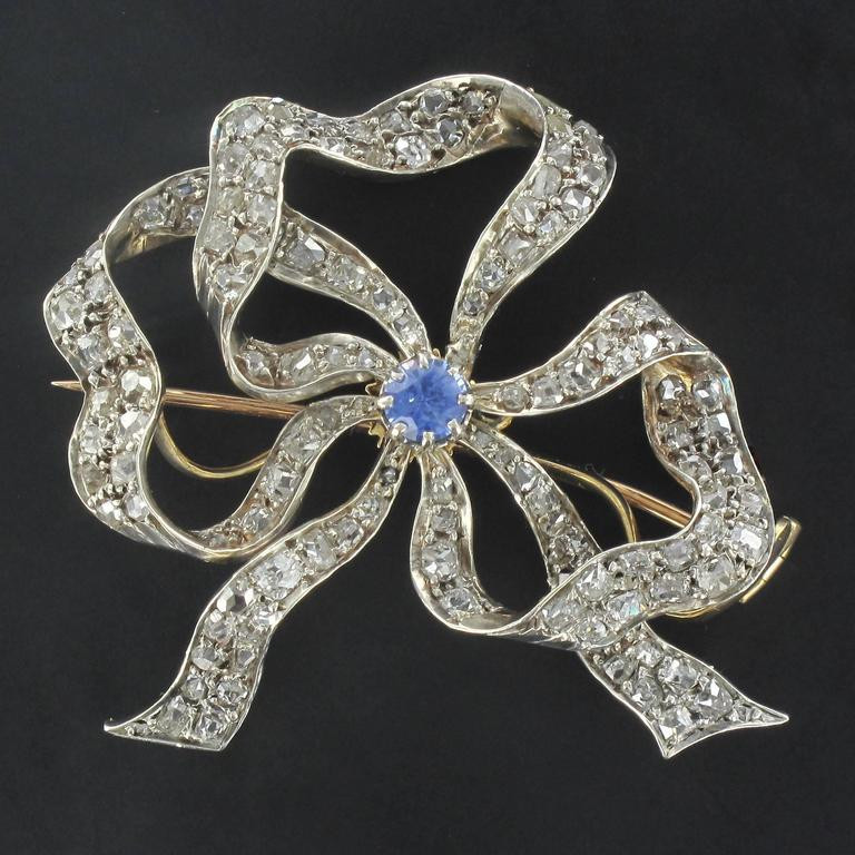 Diamond Brooches
 Pair of Antique Sapphire Diamond Brooches at 1stDibs