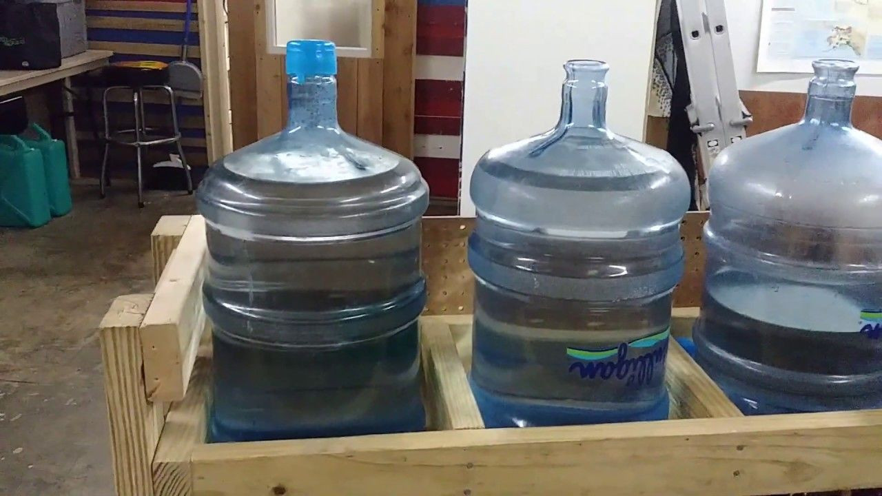 DIY 5 Gallon Water Bottle Rack
 Simple 5 gallon containers water rack system in