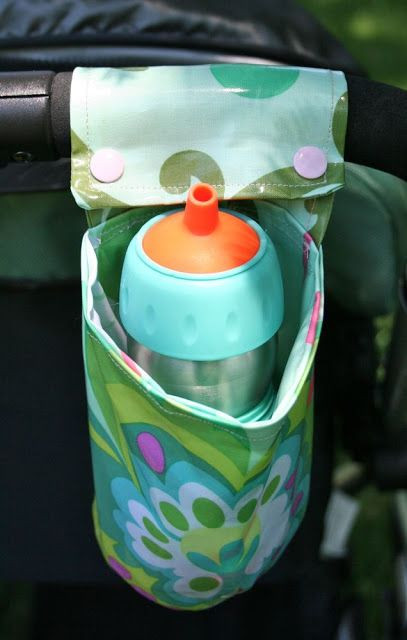 DIY Baby Bottle Holder
 Laminated Cotton Cup Holder tutorial by Cheryl of Sew Can