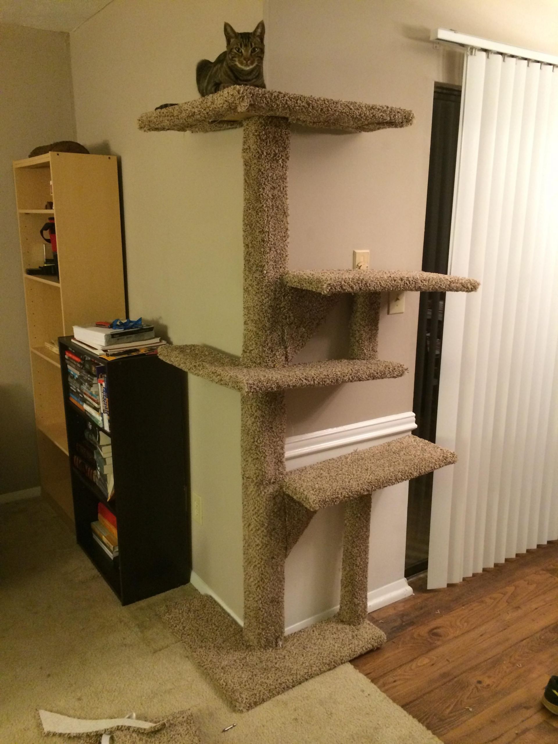 DIY Cat Tree Plans
 Cat tower that fits a corner takes up way less space and