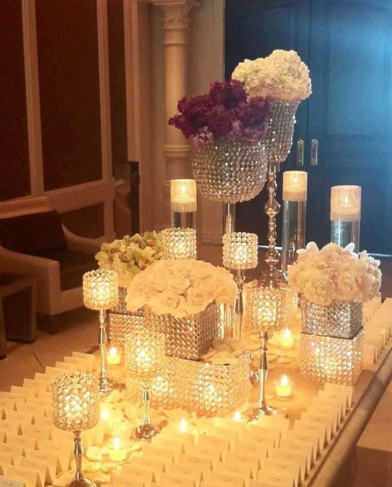 DIY Dollar Store Wedding Centerpieces
 votives and vases with stone 1 2 marbles that you can find