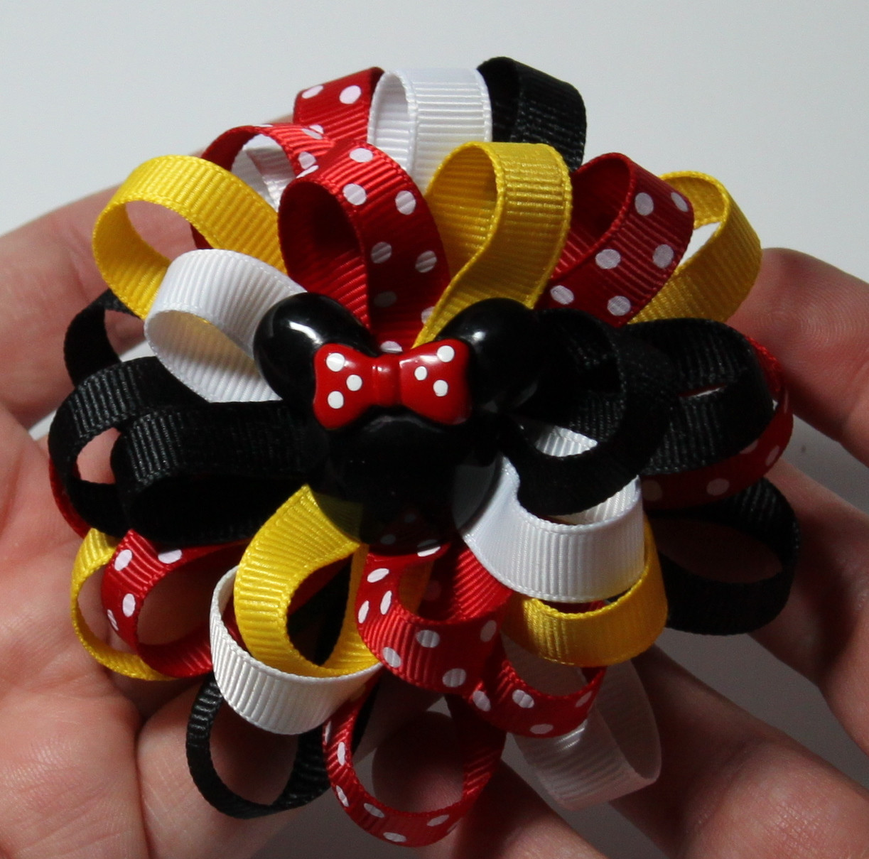DIY Hair Bow Tutorials
 Ribbons and Much More Loopy Flower Hair Bow Tutorial