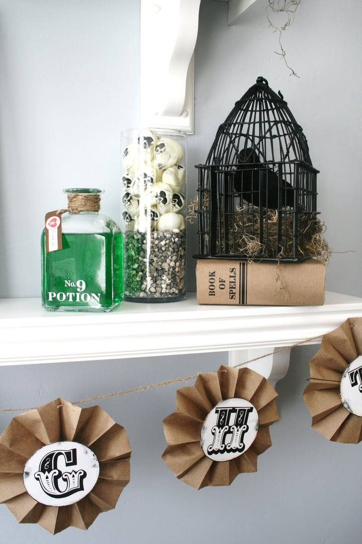 DIY Halloween Home Decor
 Use twine and antique lettering to easily dress up a shelf