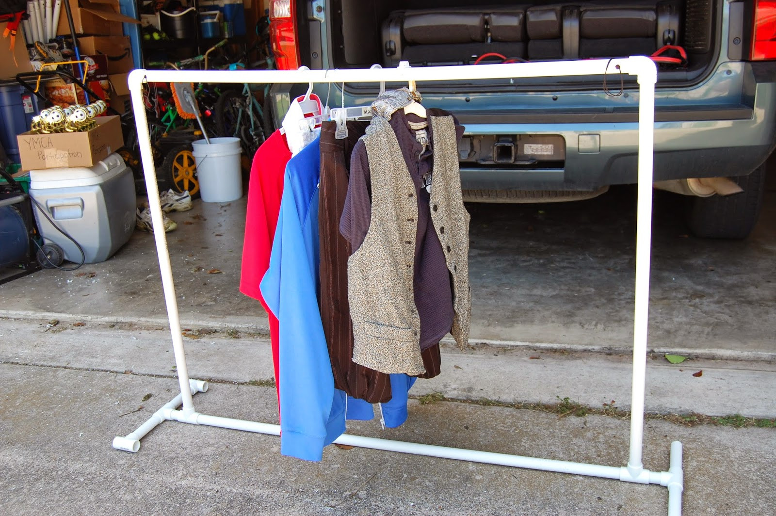 DIY Hanging Clothing Rack
 Blessed With Boys Easy DIY PVC Clothes Rack