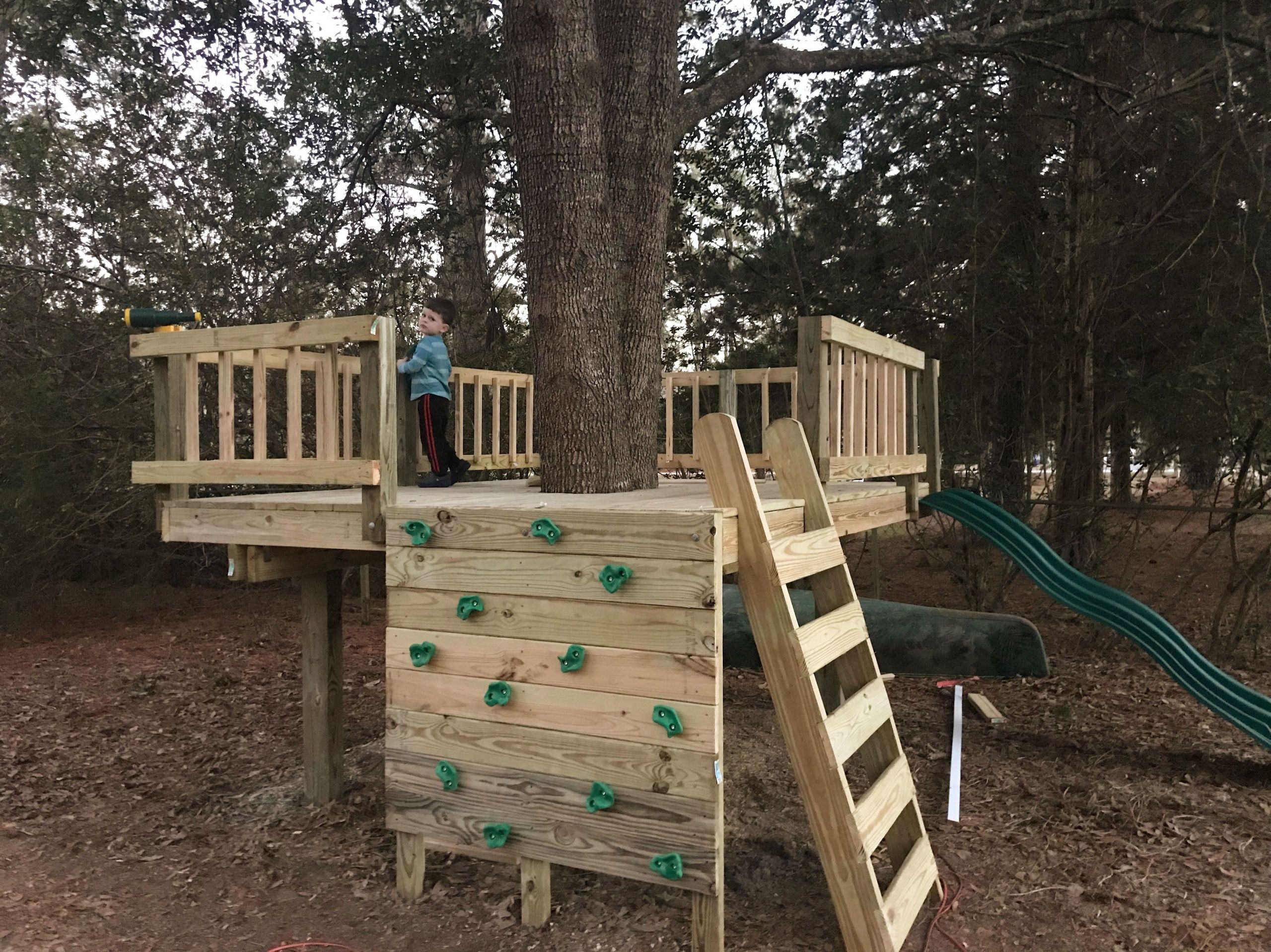 Diy Kids Forts
 DIY Tree Fort kids rock wall tree house railing play