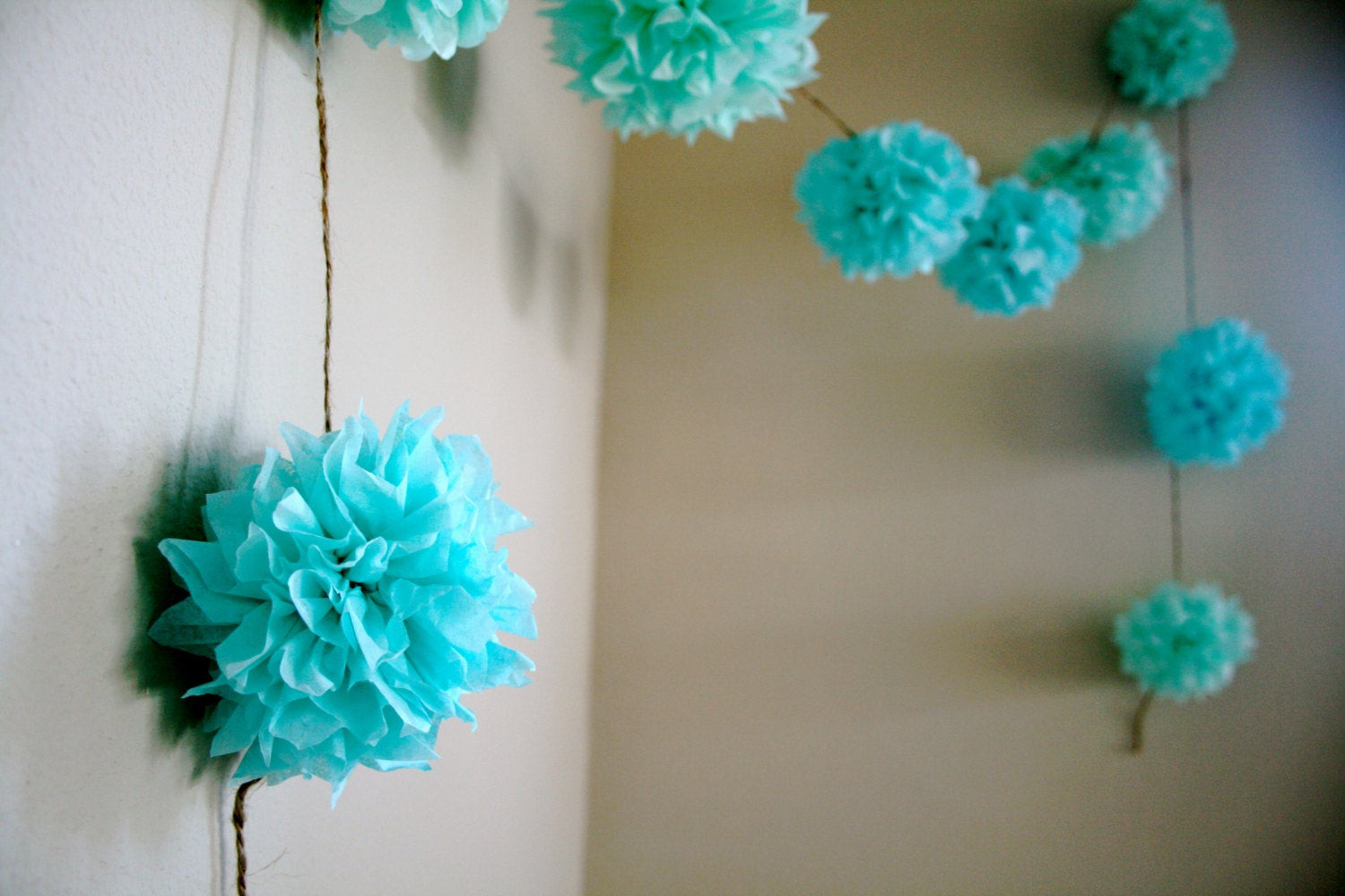 DIY Tissue Paper Decorations
 Aqua Love diy tissue paper pom garland nursery by