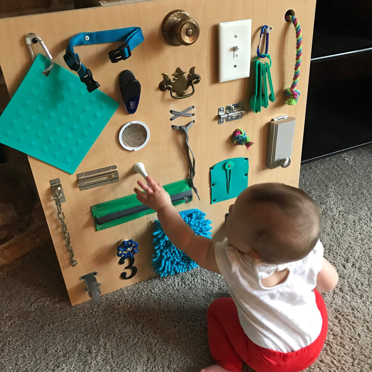 DIY Toddler Activity Board
 Build a Toddler Busy Board with Items You Already Have