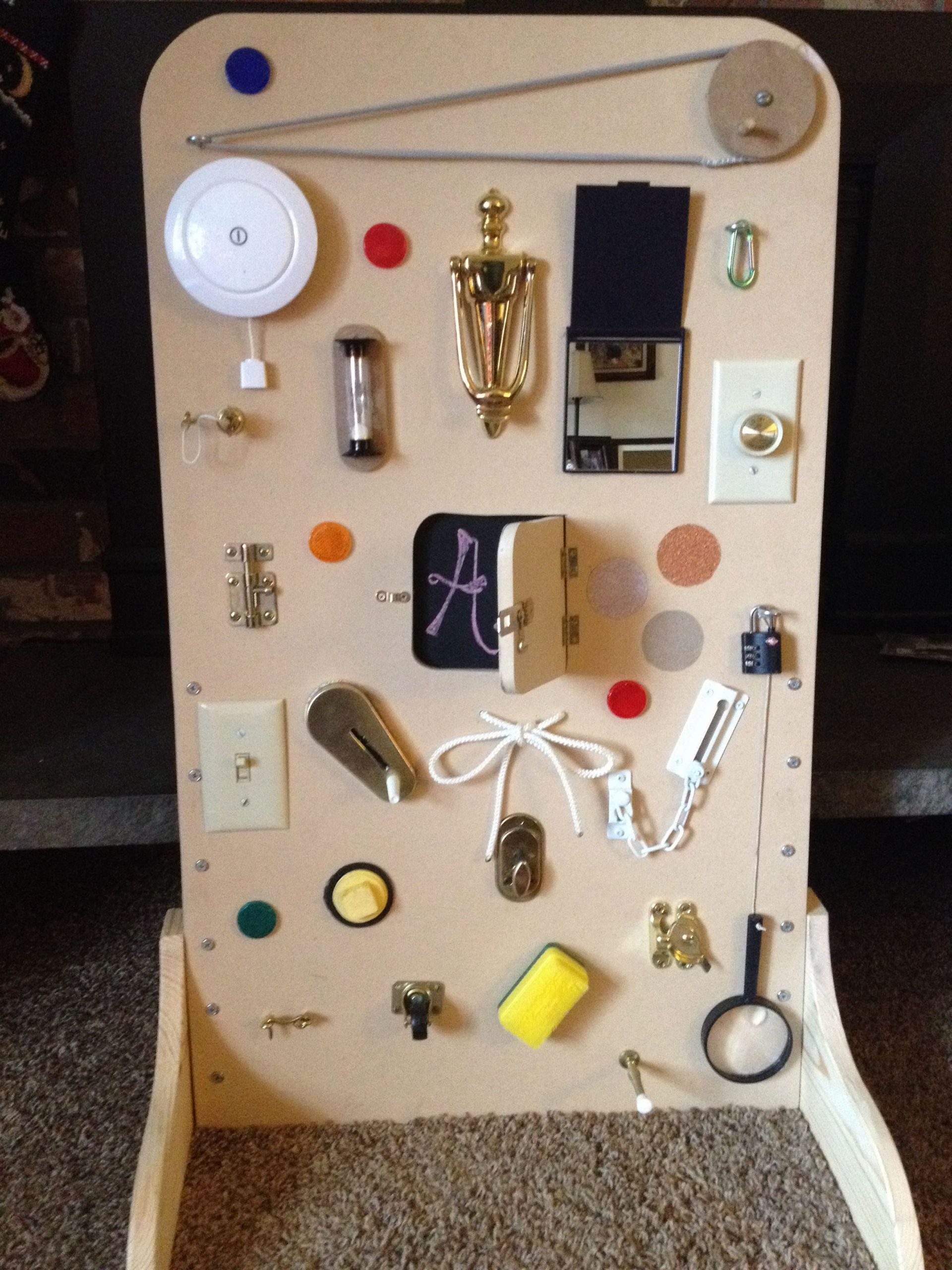 DIY Toddler Activity Board
 Latch Board Activity Board Just made one for Ev but put