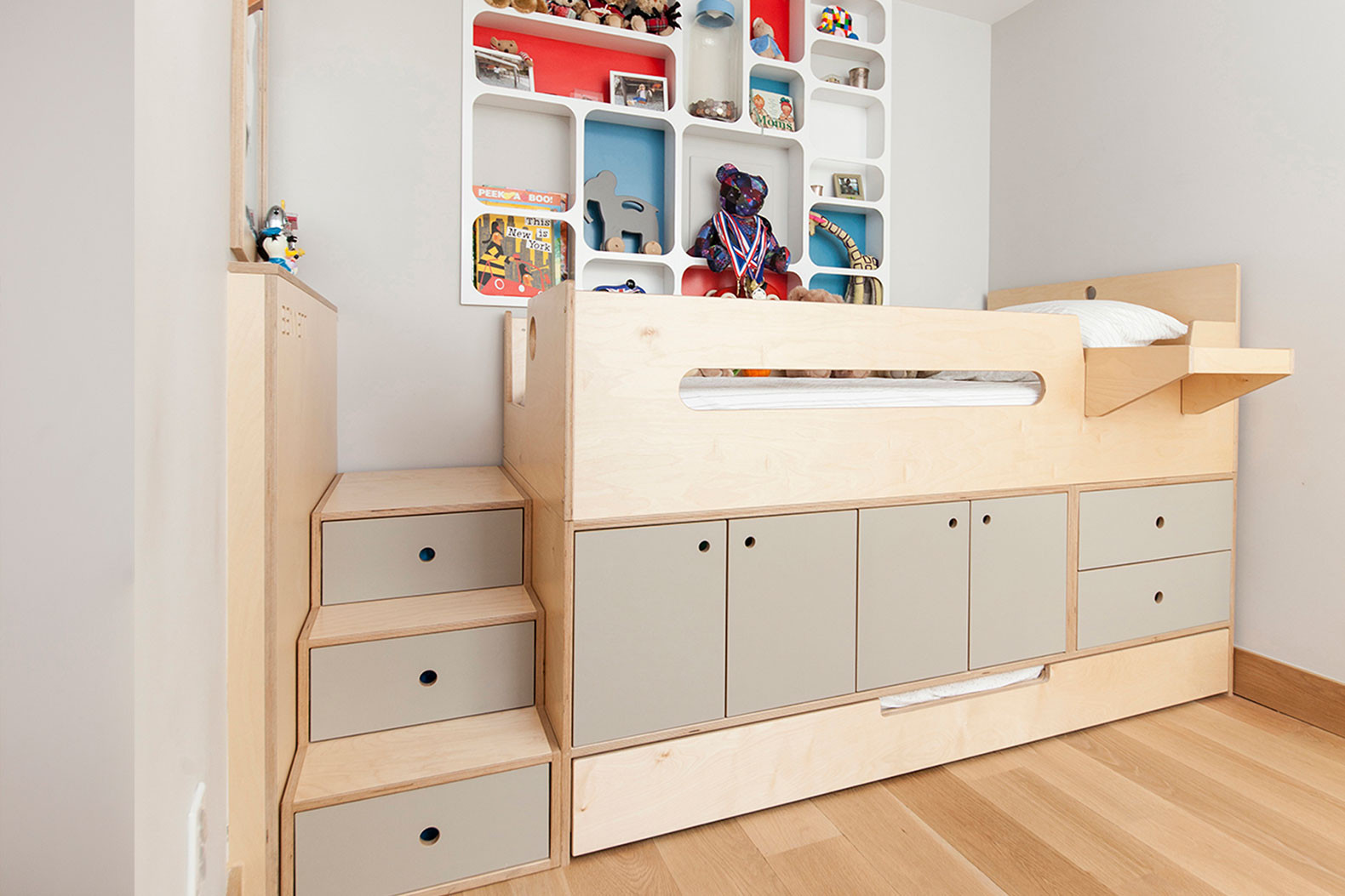 DIY Toddler Bed With Storage
 Clever raised storage bed stashes all your stuff away