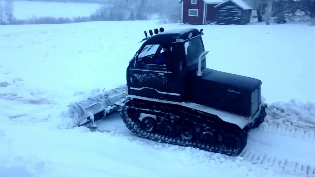 DIY Tracked Vehicles
 Homemade tracked vehicle snow plowing