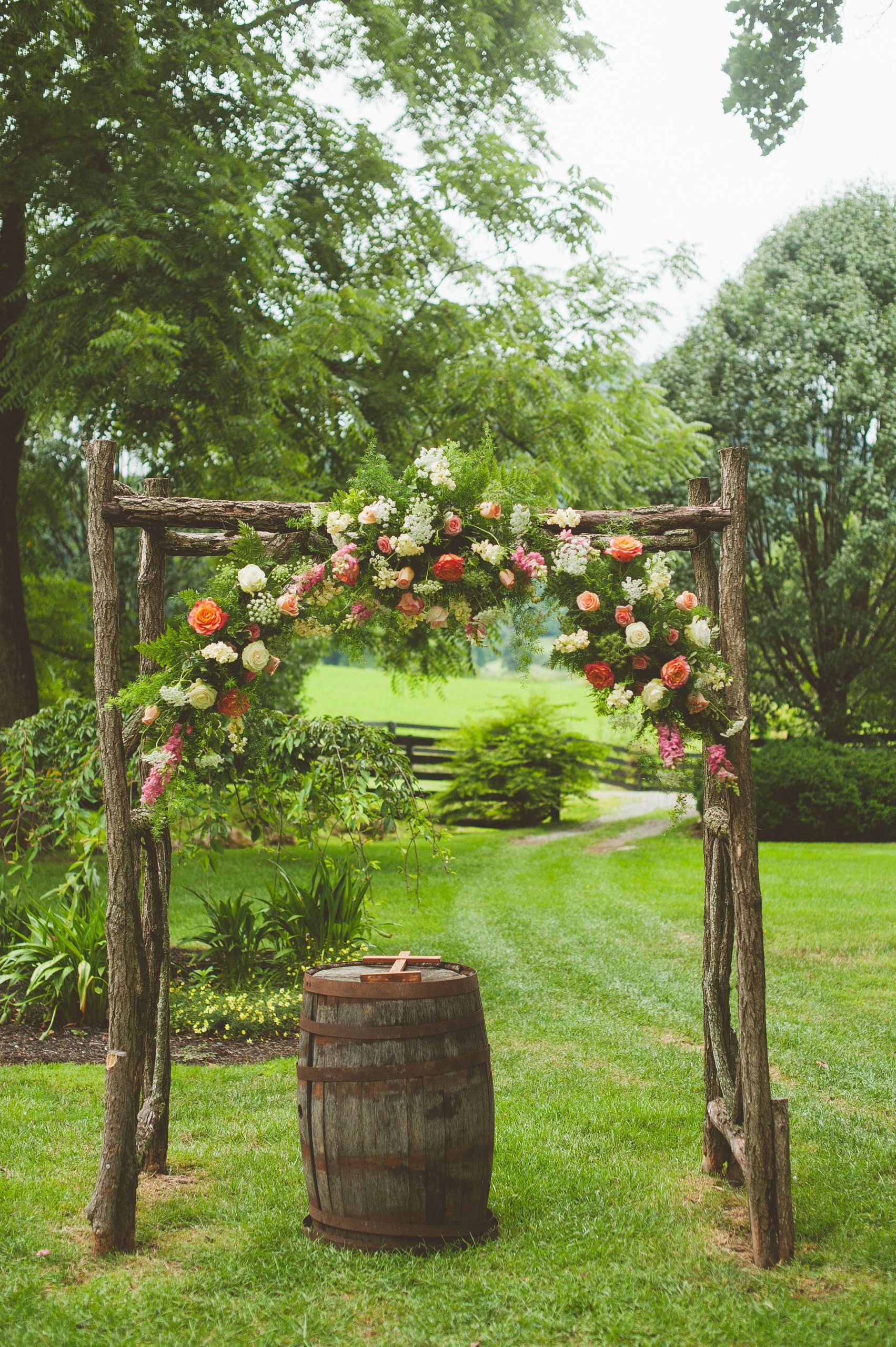 DIY Wedding Arch Wood
 Wooden Wedding Arch With Coral Flowers