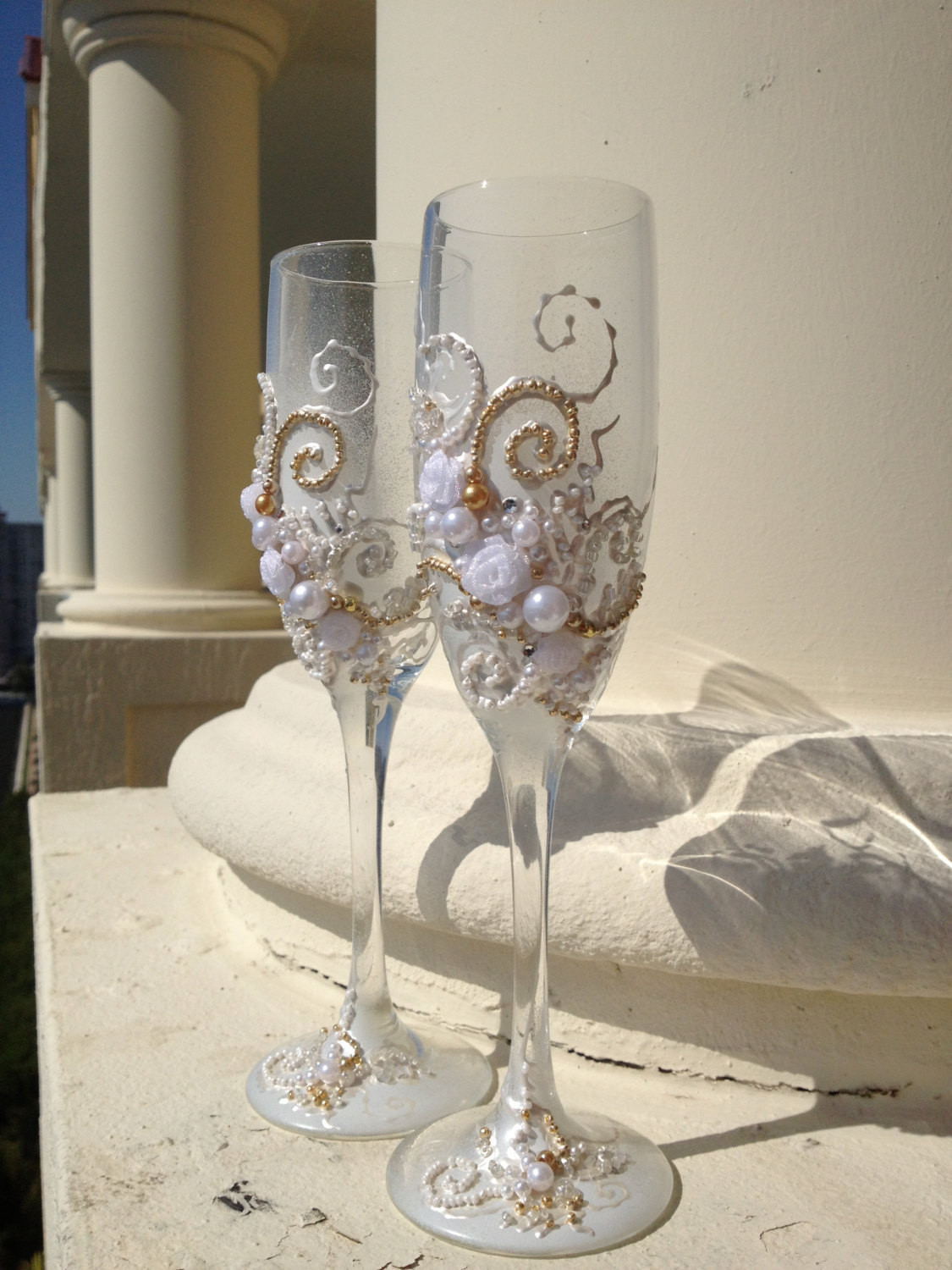 DIY Wedding Glasses
 Wedding toasting glasses hand decorated with an original