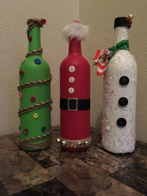 DIY Wine Bottle Christmas Decoration
 Items similar to Repurposed Wine Bottle Christmas Decor on