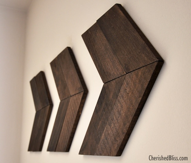 DIY Wood Arrow
 28 Ideas for Gorgeous DIY Gallery Walls – Tip Junkie