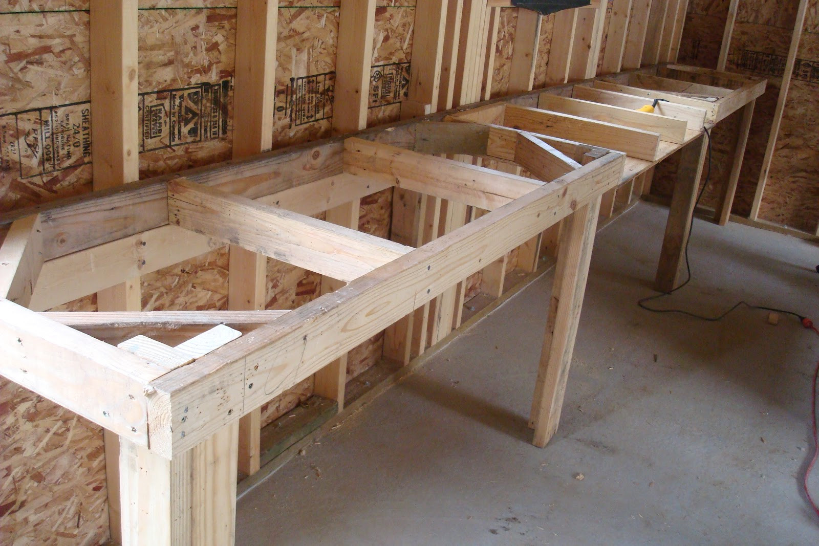 DIY Wooden Workbenches
 From Needles to Nails Workbench From Reclaimed Wood