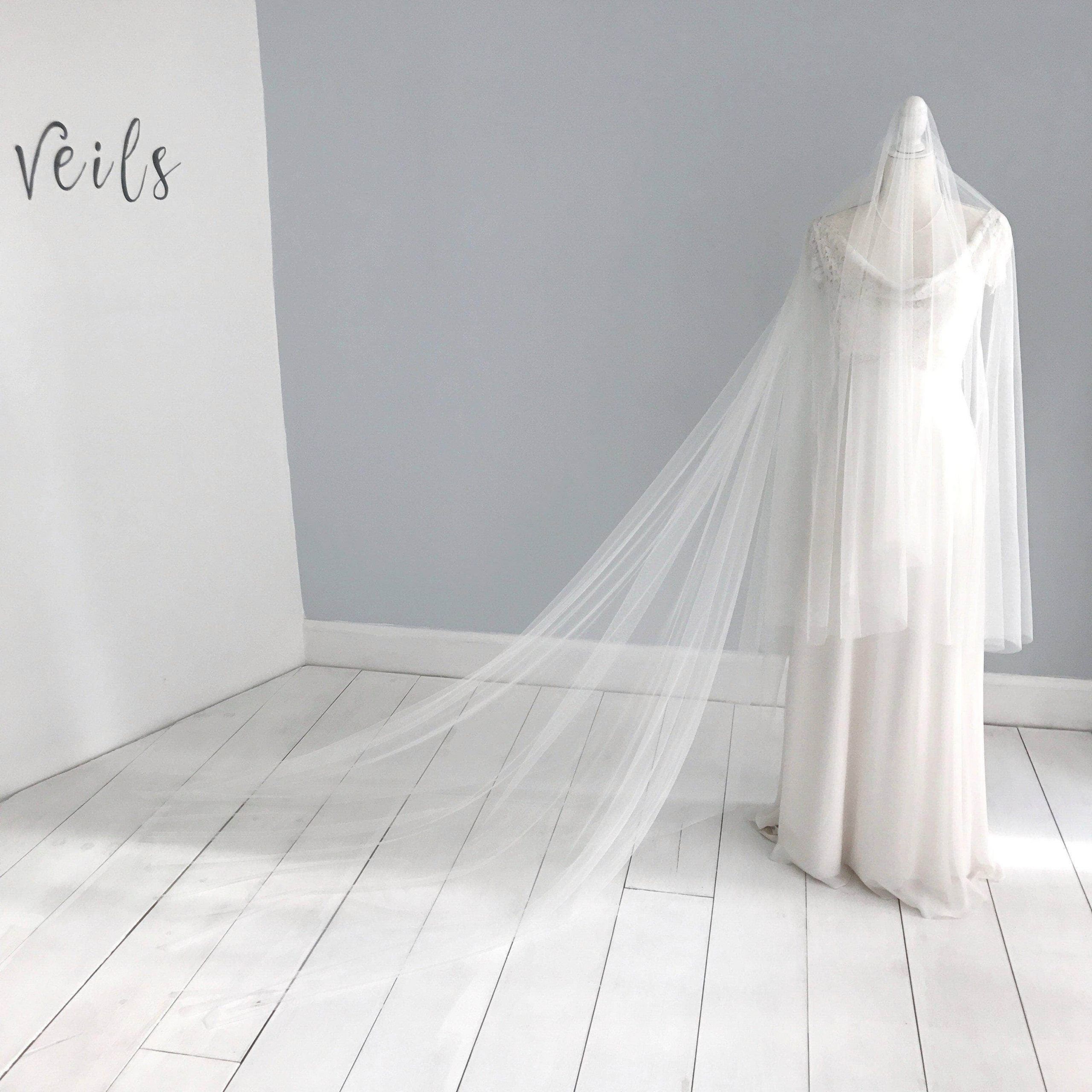 Extra Long Wedding Veils
 Cut edge silk style wedding veil with extra long blusher