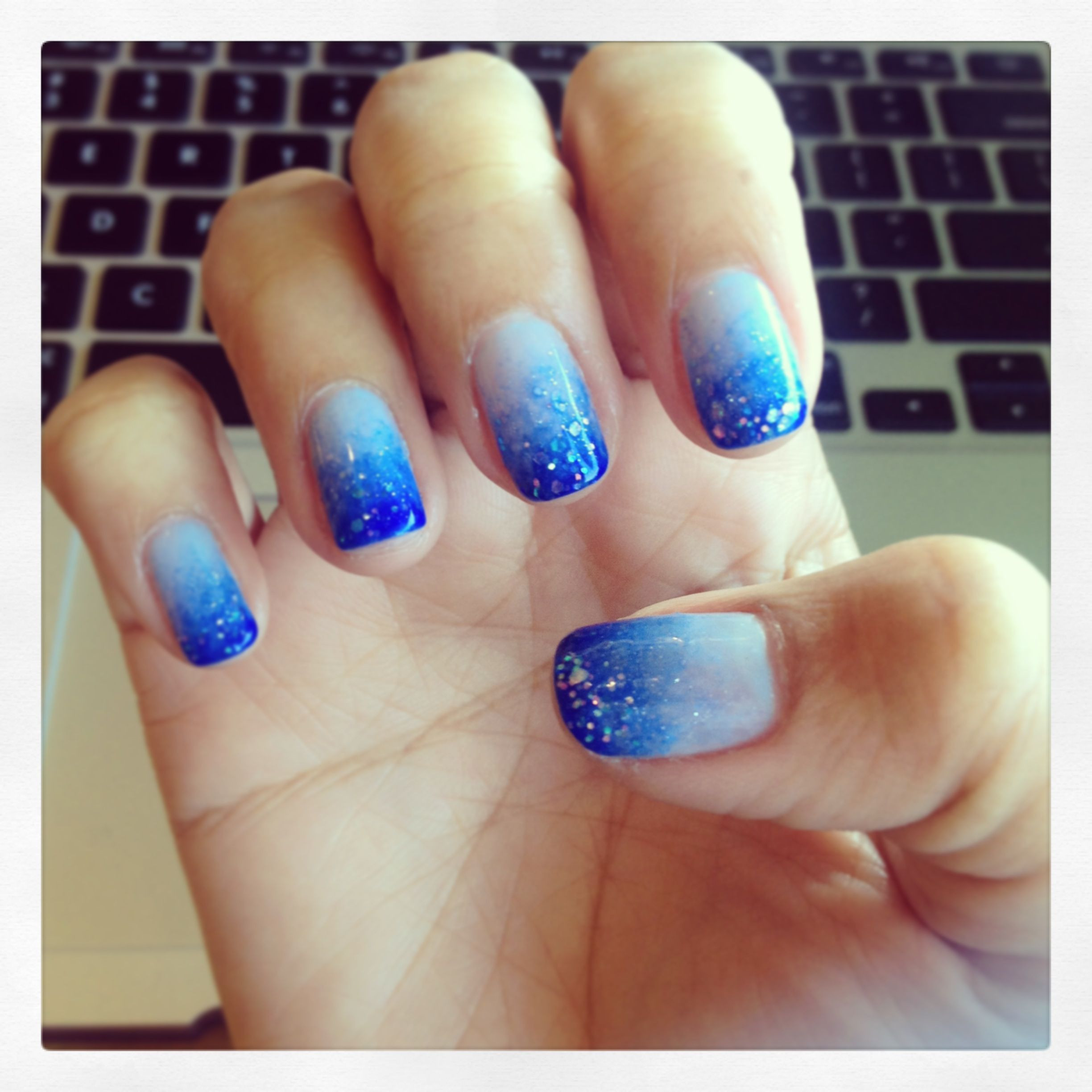 Fading Nail Designs
 Blue fading nails with glitter Gel Nail Designs