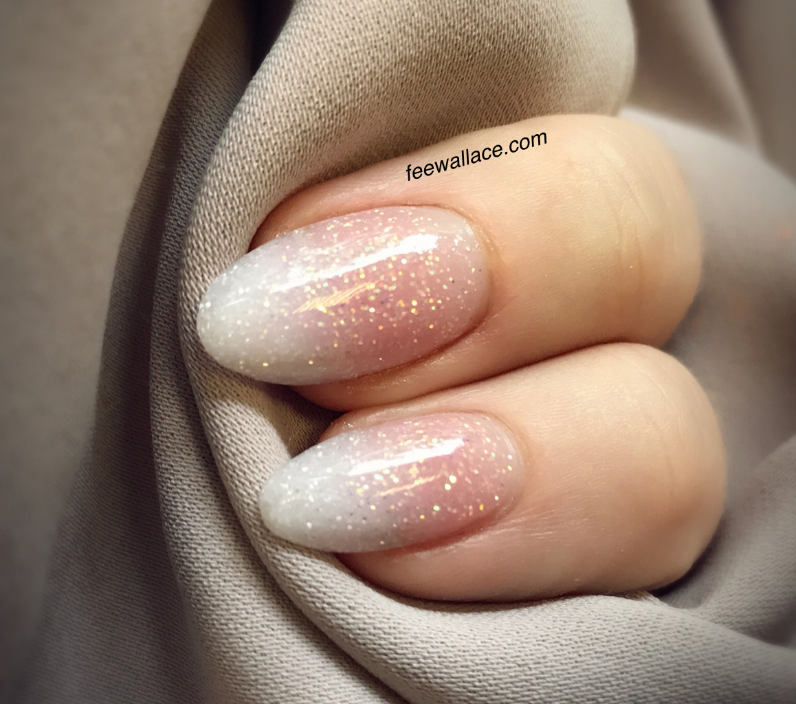French Ombre Nails With Glitter
 Subtle glitter oval ombré French