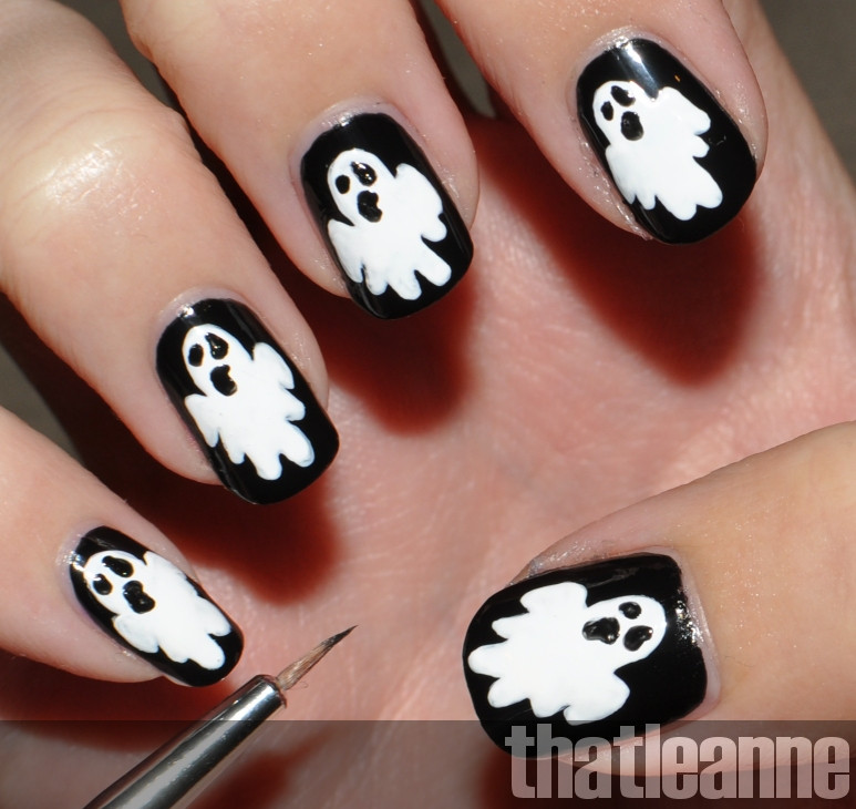 Ghost Nail Art
 thatleanne Glow in the dark ghost nail art for Halloween