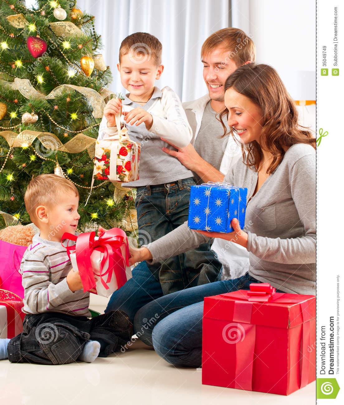 Gifts For Families With Kids
 Christmas Family stock image Image of open room festive