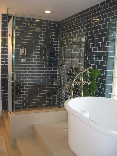 Glass Subway Tile Bathroom
 Dark teal subway tiles and a glass enclosed shower give