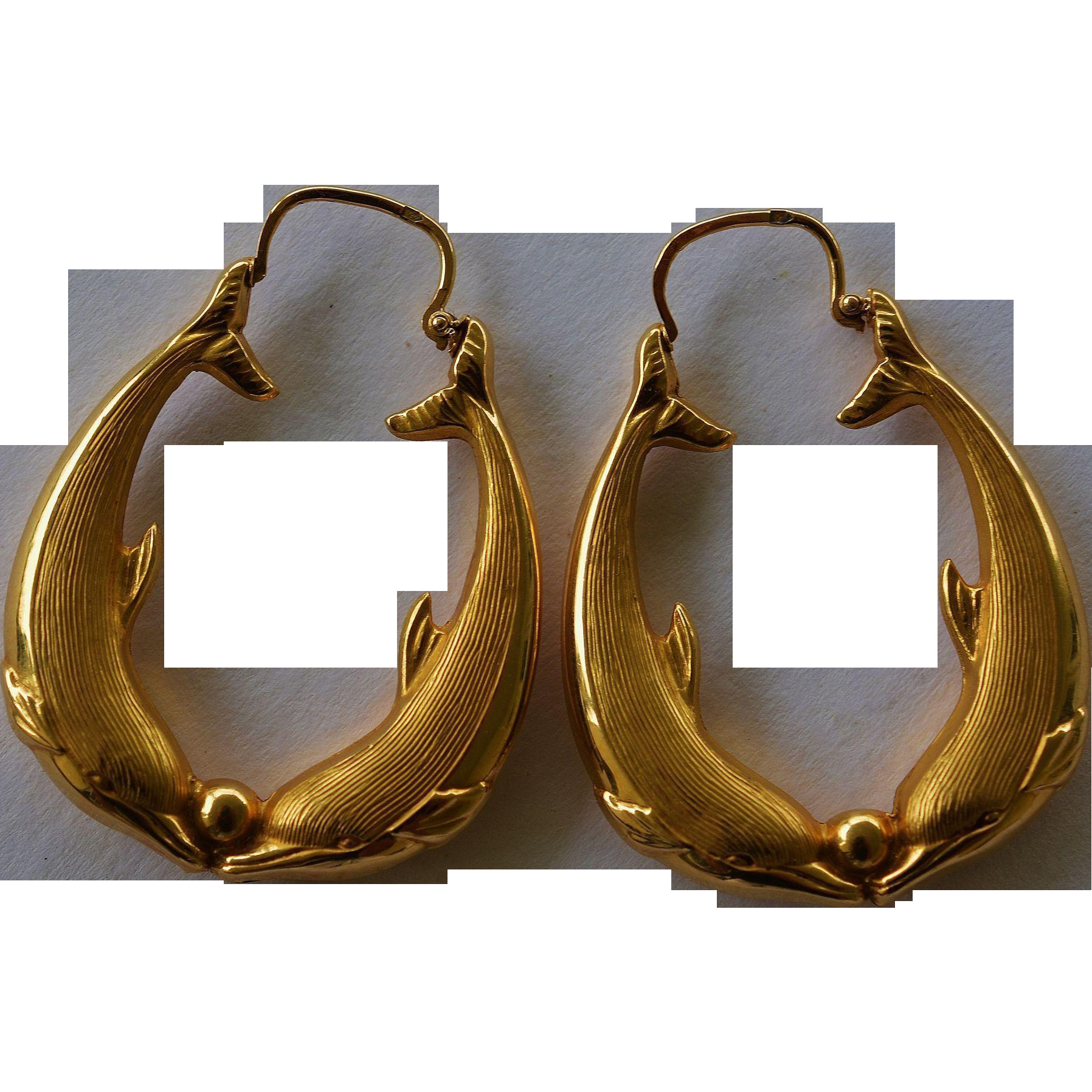 Gold Dolphin Earrings
 14kt Gold Dolphin Hoop Earrings from antiquepooch on Ruby Lane