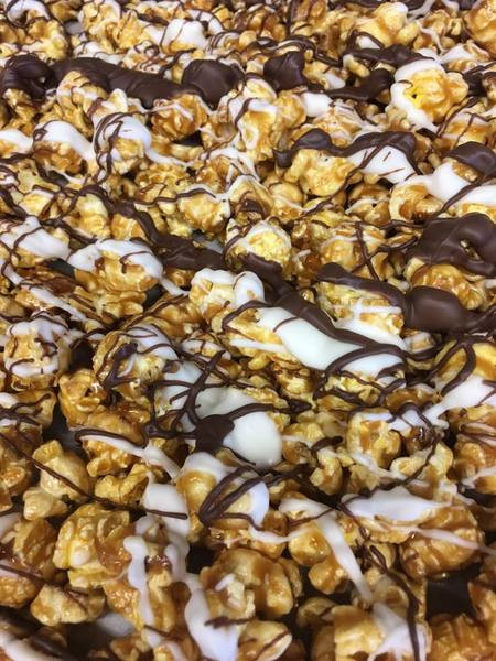 Gourmet Chocolate Popcorn
 Gourmet Caramel Popcorn Drizzled with White and Brown