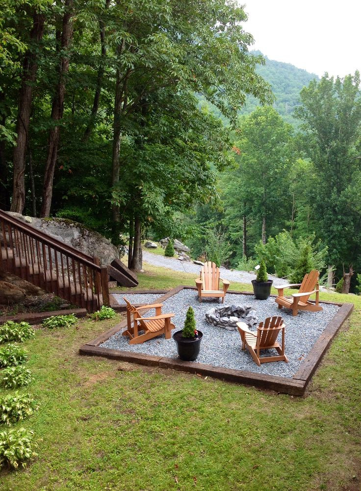 Gravel Patio With Fire Pit
 Beautiful fire pit and chairs with square framed gravel