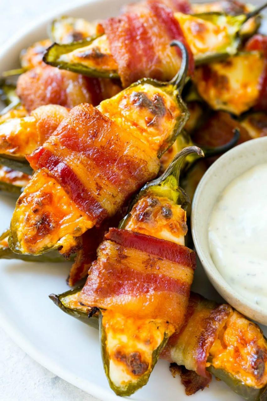 Grilled Bacon Wrapped Jalapeno Poppers
 Score Big with these 100 Mouth Watering Appetizers for the